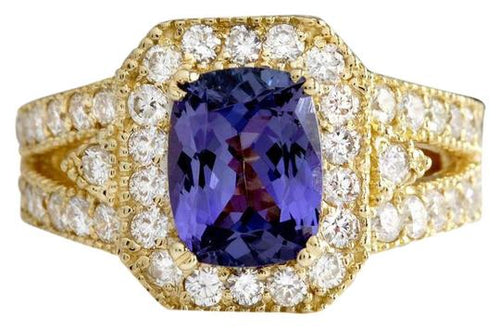 3.30 Carats Natural Very Nice Looking Tanzanite and Diamond 14K Solid Yellow Gold Ring