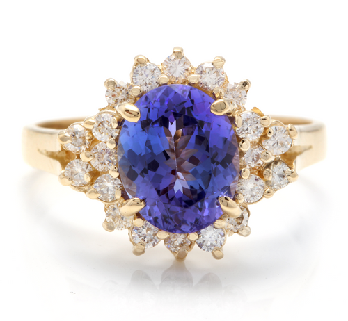 3.90 Carats Natural Very Nice Looking Tanzanite and Diamond 14K Solid Yellow Gold Ring