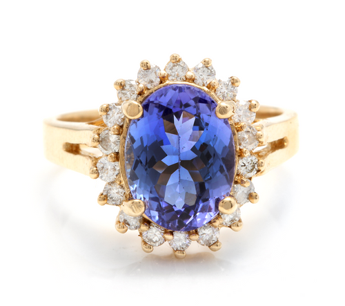 4.10 Carats Natural Very Nice Looking Tanzanite and Diamond 14K Solid Yellow Gold Ring